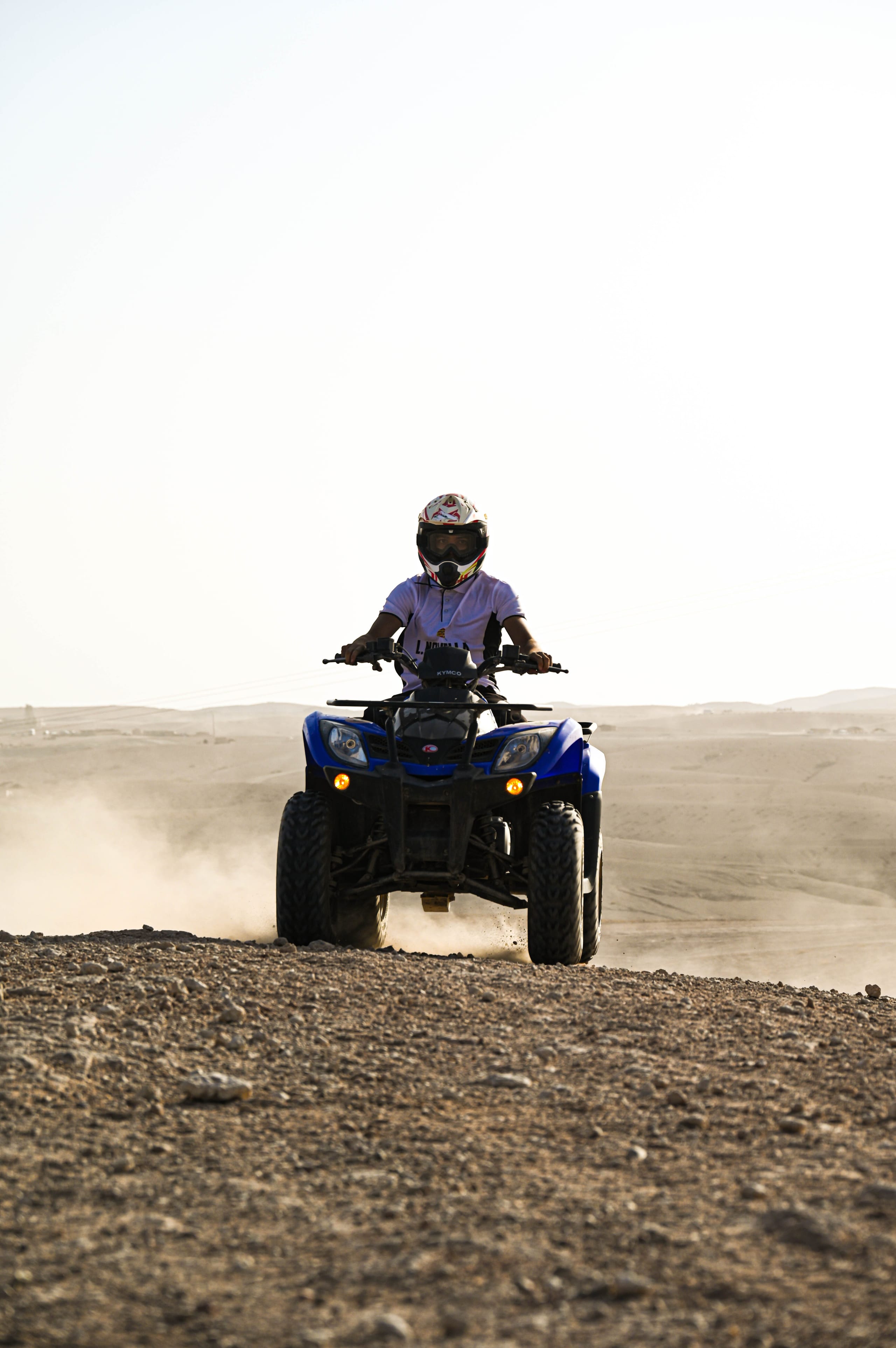 quad biking action shot Morocco desert
