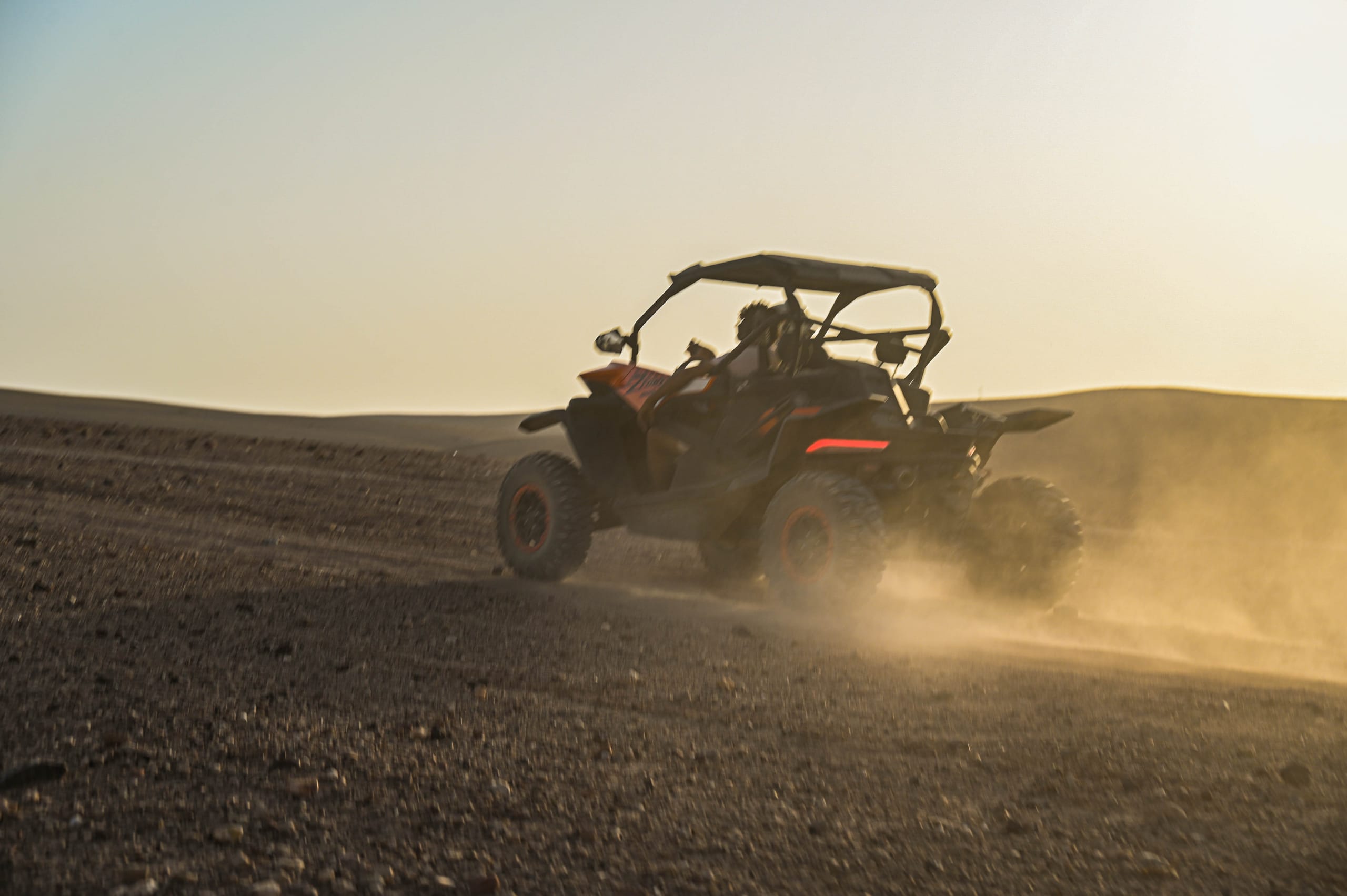 quad biking action shot Morocco desert